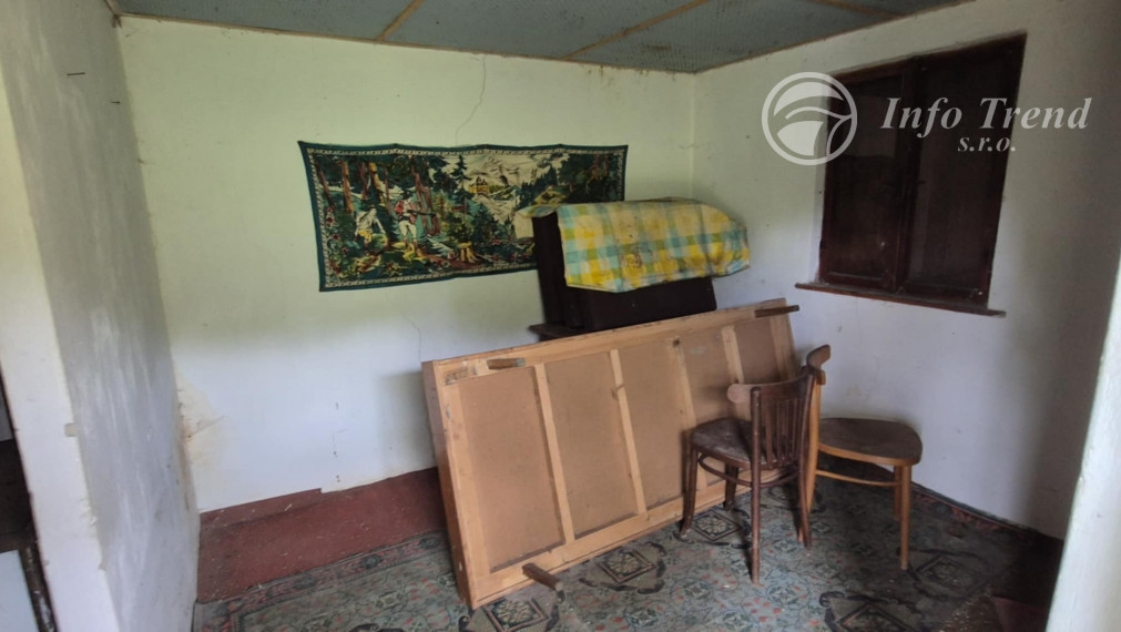 Veľký pozemok v Bardejove časť za Šibeňou horou s murovanou chatou